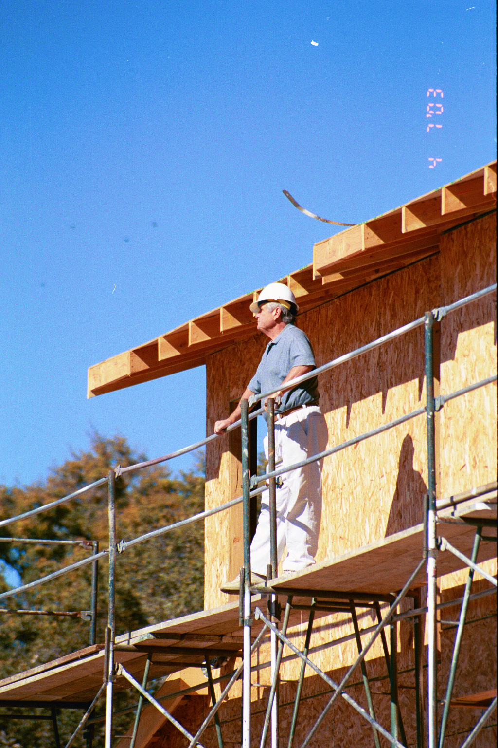 Bill Brown observing a jobsite circa 1990