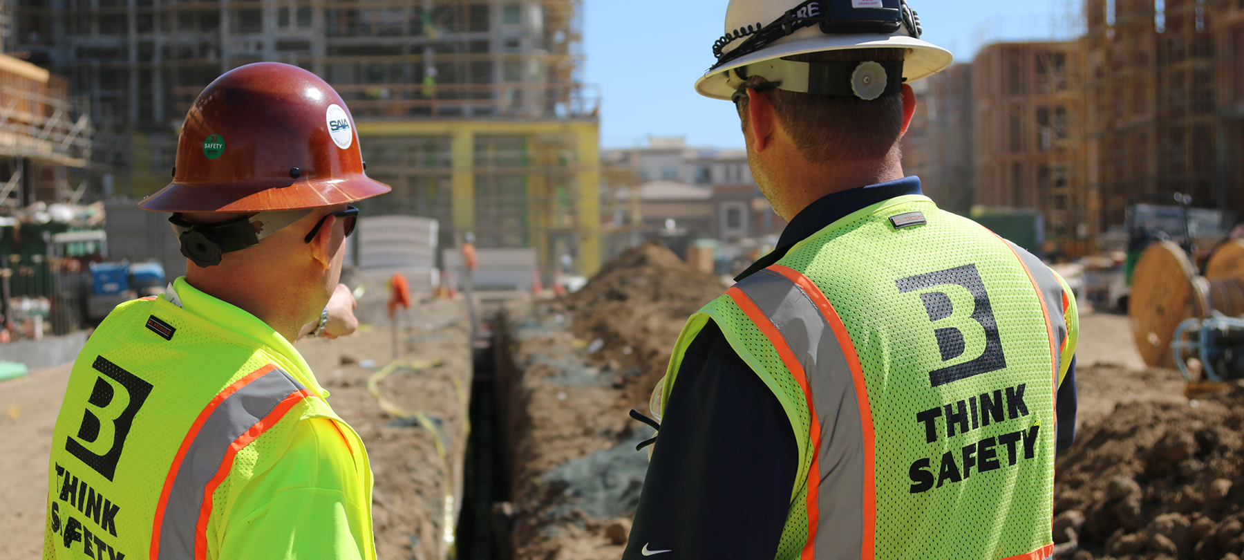 Phil DeFazio and Parker Daughhetee discussing trench safety on Ascent job site