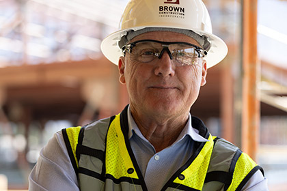 Ron Brown with PPE on a Brown Construction job site Aggie Square