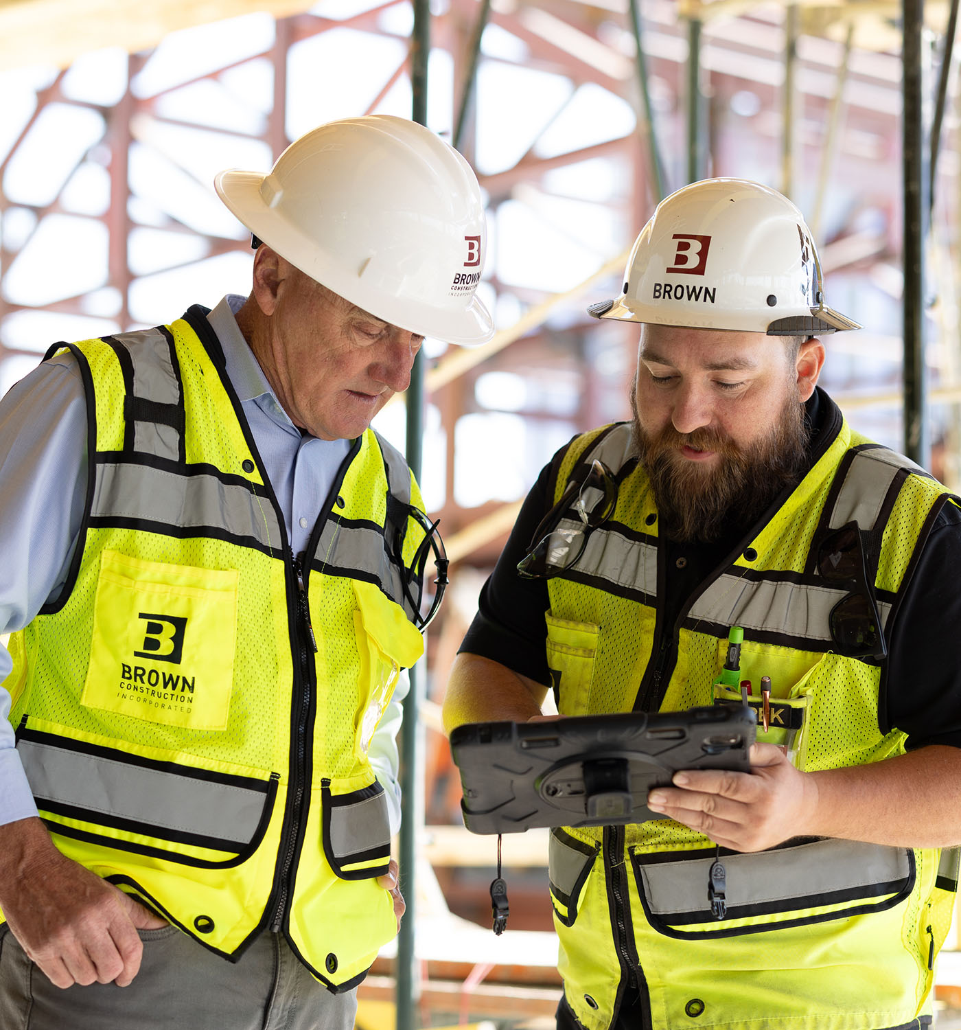 Ron Brown and Derek Wichmann inspecting Aggie Square building